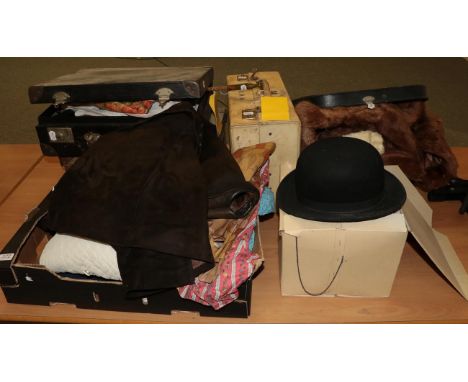 Four vintage suitcases, one containing fur coats, stoles, belts and other items, another containing an oriental paper parasol