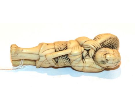 Japanese ivory netsuke, figure with fish, 7cm high . Weight 28g