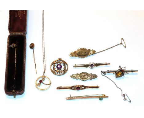 Four brooches, stamped '9CT', various designs, a brooch stamped '15CT', a silver spider brooch, an Edwardian pendant on chain