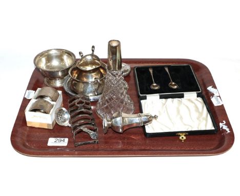 A collection of assorted silver and silver plate to include pepperette, toast rack, sugar bowl, snuff box, vintage suitcase, 