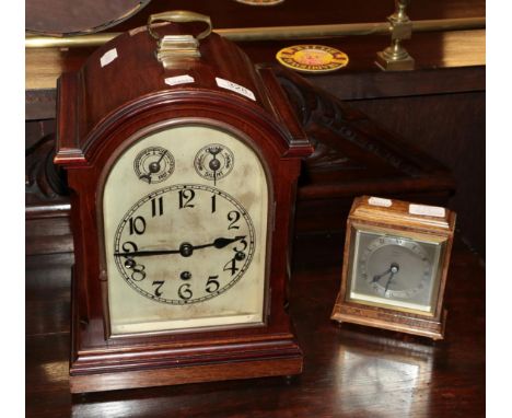 An early 20th century mahogany bracket clock, triple chain movement, 37cm high; together with an Elliott clock, retailed by G