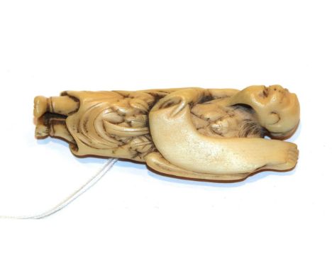 Japanese ivory netsuke, figure with scroll, 6cm high.  Weight 11g. Discoloured splits, all over wear and surface discolourati