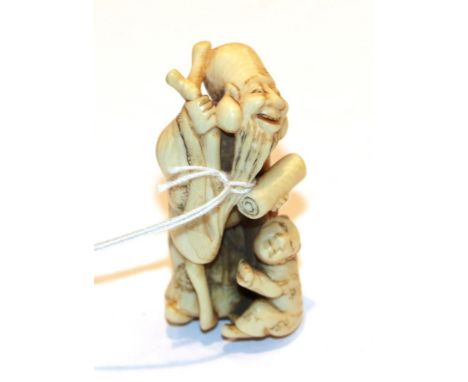 Japanese ivory netsuke, Jurojin with boy, 5cm high. Weight 20g