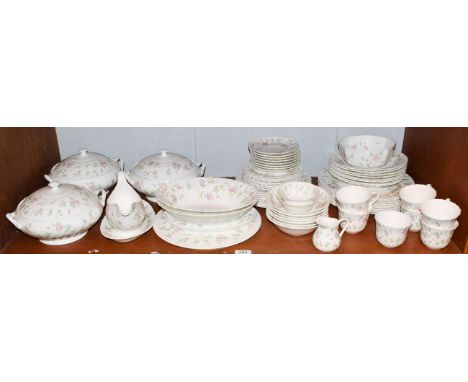 A quantity of Wedgewood 'Rosehip' pattern dinner and tea wares, including dinner and tea wares including eight dinner plates,