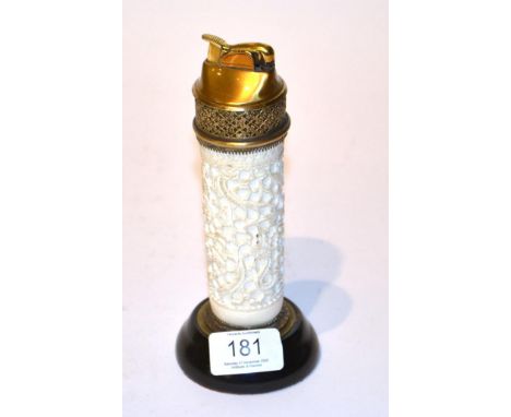 An early 20th century carved ivory column shaped table lighter, 18cm high 