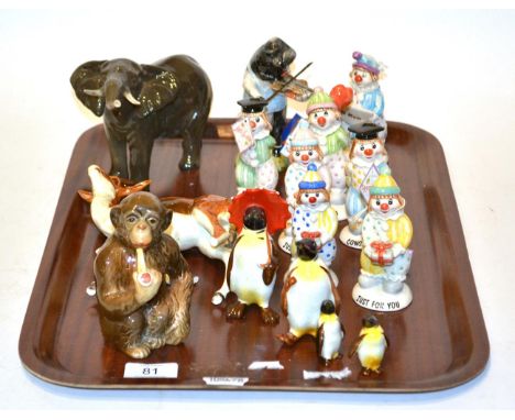 Beswick wild animals comprising Springbok, model No. 1048; Elephant, model No. 974, Chimpanzee with Pipe, model No. 1049 and 