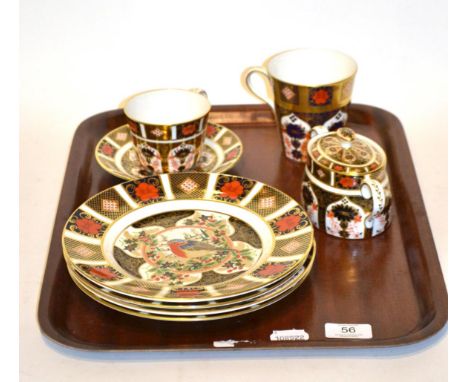 Four Royal Crown Derby Christmas plates, sugar basin, mug and tea cup with saucer, plates 22cm diameter  .  In good condition