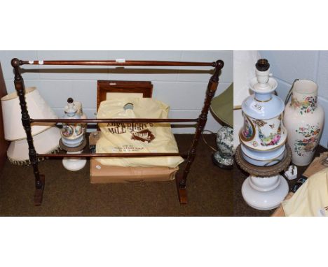 A decorative porcelain and gilt metal lamp, two mahogany and satinwood picture frames, towel rail etc  