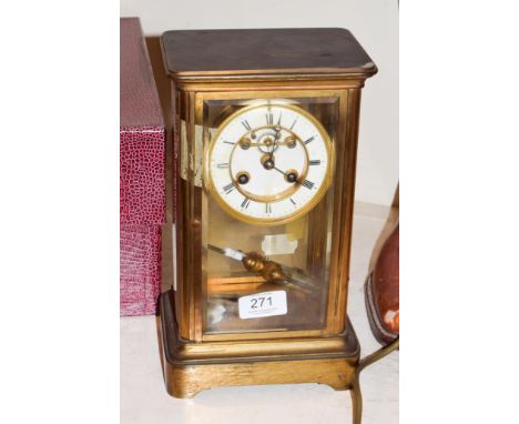 A brass four glass striking mantel clock, movement stamped S Marti, striking on a bell, with a twin mercury tubed pendulum, 2