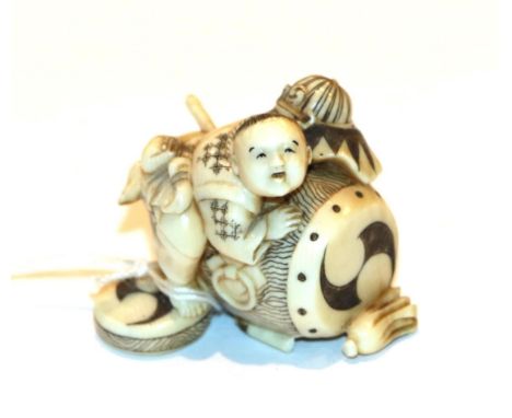 Japanese ivory netsuke, boy and drum, 3cm high.  Weight 20g