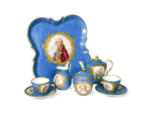 A Sèvres style tete à tete tea service, the blue ground bodies reserved with panels painted with King Louis XVI, Queen Marie 