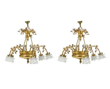 A pair of six light electroliers, 20th century, with foliate frosted glass shades, a pair of two light brackets and a pair of