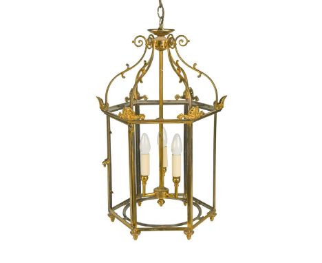 A Regency style brass hall lantern, modern, retailed by Howe, of hexagonal form with three light fitting61 x 41cm Condition r