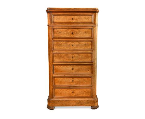 A French walnut secretaire abattant, 19th century, with faux drawer fall front enclosing a fitted interior and four real draw