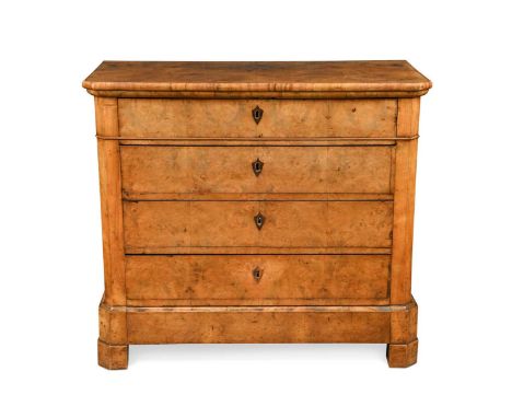 A French walnut commode chest, 19th century, the moulded rectangular top with canted corners over four long drawers raised on