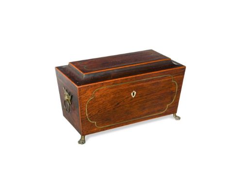 A Regency rosewood tea caddy, of sarcophagus form with brass inlay raised on paw feet17 x 31 x 15cmCondition report: Marking 