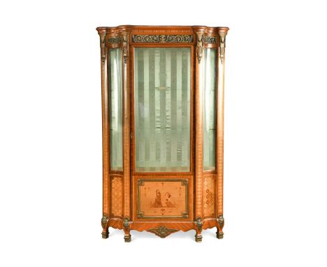 with gilded ormolu mounts with central glazed panel door with an inlaid figural panel below, flanked by concave glazed and pa