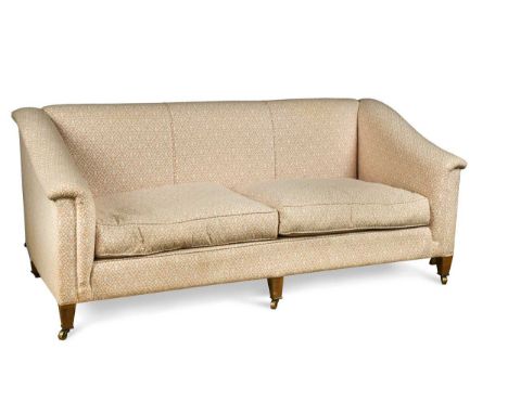 A Howe sofa, modern, raised on tapered legs and brass castors83 x 194 x 83cmCondition report: Structurally sound, some light 