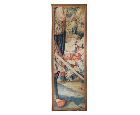 A Flemish tapestry panel fragment, circa 1600, depicting a kneeling gentleman surrounded by pointing hands and a drawn sword 