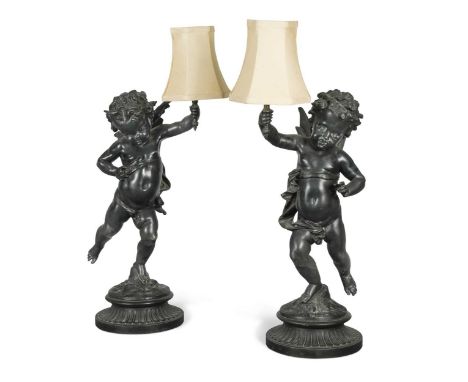 each modelled upon one leg holding the light fitting above49cm high to top of bulb fittingCondition report: Hole to the back 
