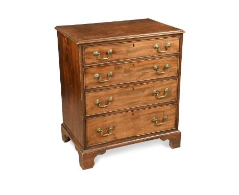 A George III and later mahogany chest of drawers, the top drawer fitted with compartments and a hinged mirror over three long
