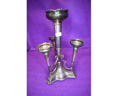 A silver plated Epergne having trumpet shaped vessels.