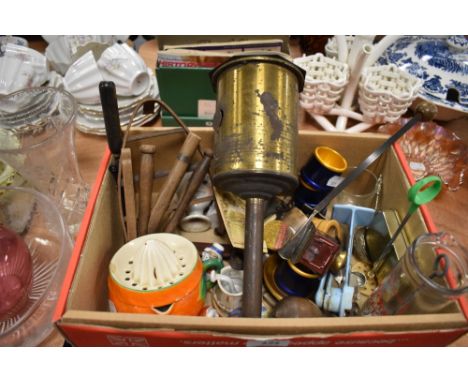 A box of miscellaneous vintage items including lemon squeezer in the form of an orange,pegs,egg cups,measures and more intere