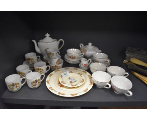 A souvenir childrens tea service of Isle of Man interest, and a similar service having floral transfer pattern, also included