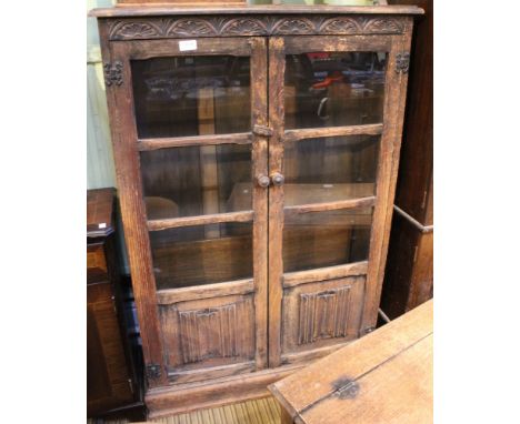 A two door glazed book shelf