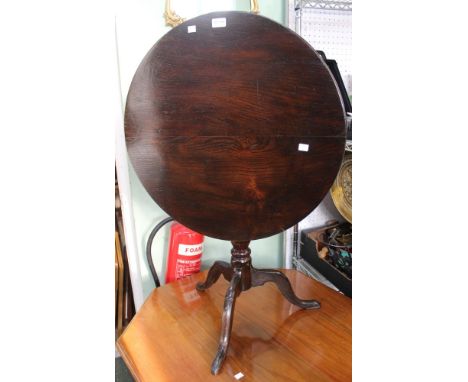 A probable early 19th century flip top tripod table