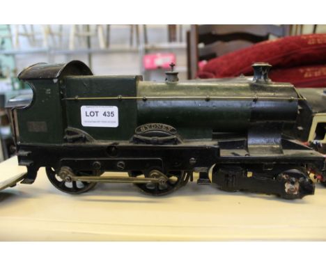 A selection of vintage tin plate O gauge model railway stock. Possibly Bing. Two engines Sydney 3410 clockwork with another s