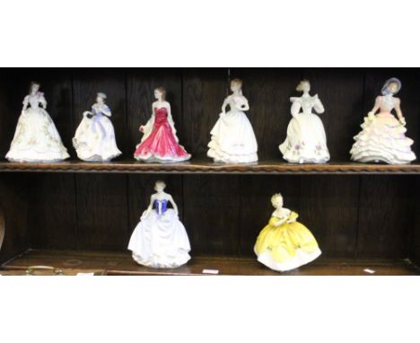 Eight figurines comprising of Royal Doulton, Worcester and Compton Woodhouse