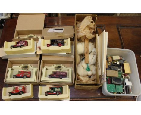 A Pelham Poodle puppet in original box, together with various model cars