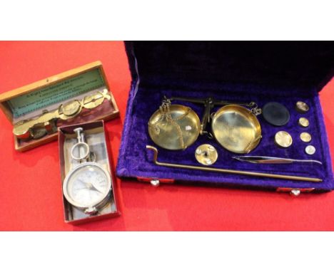 The "Improved Sovereign Balance" in original case, a cased set of scales and a pair of folding binoculars with compass (3)