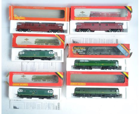 Eleven previously run boxed OO gauge electric diesel locomotive train models (1x Class 25, 2x Class 35, 1x Class 37, 2x Class