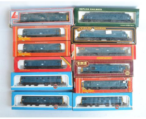 Twelve previously run boxed OO gauge electric diesel locomotive train models (3x Class 31, 3x Class 25, 1x Class 47, 2x Class