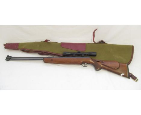Weihrauch model HW 77 K .22 Air Rifle, with under lever action, beech stock with chequered pistol grip and Bisley scope, with