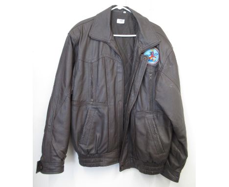 U.S. Air Force leather bomber jacket (L) with U.S. Army Air Force patch to left sleeve and U.S.A.A.F. 406th Bomb Squadron pat