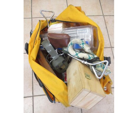 Large assortment of gun cleaning accessories, including cleaning patch, gun oil, rods, etc. Also with a pair of shooting glas