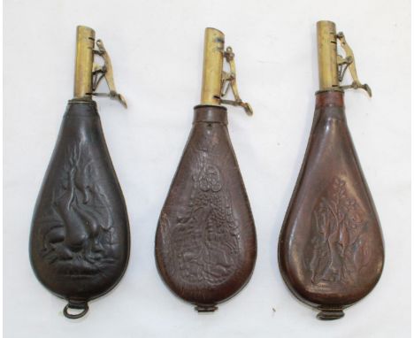 Dixon &amp; sons brass and leather shot flask showing hanging game and two others 
