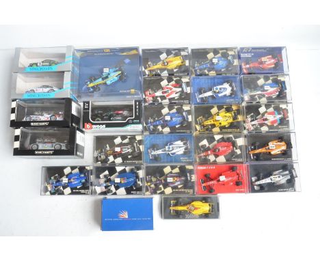 Twenty six boxed/cased 1/43 scale diecast F1 and racing car models from Minichamps, Burago and Onyx, all models appear in at 