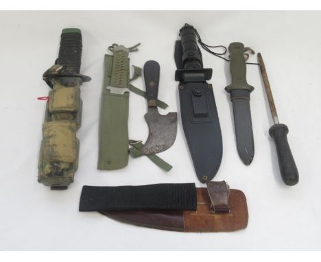 Assortment of bladed tools, including a survival knife with fishing line, a leather worker's knife, a Rostfrei fishing knife,