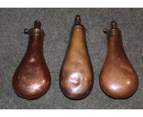 Pair of copper and brass, plain powder flasks by Dixon &amp; Sons. Plain, copper and brass, tear drop powder flask