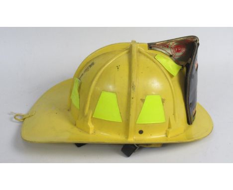 C1980s Cairns and Bro helmet, with original lining and 'Engine 3 Lincoln' shield