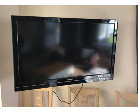 A Toshiba television with wall bracket.