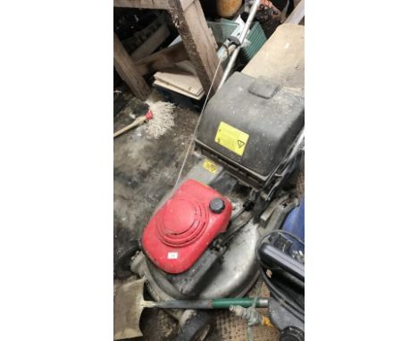 A Honda HRD55 petrol rotary mower.