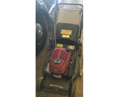 A Honda GCV160 self propelled rotary mower.