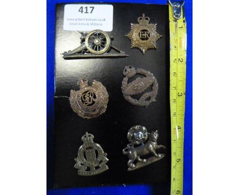 Six Small Army Cap Badges 