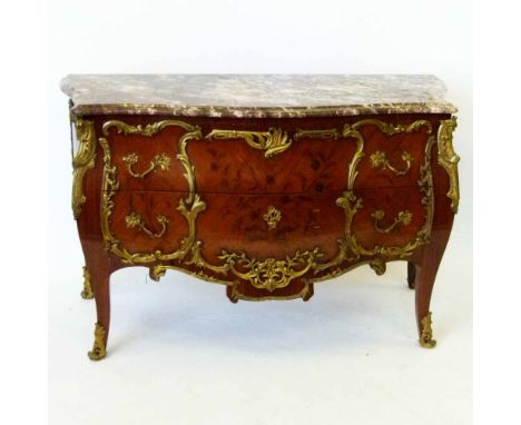 Louis XV syle kingwood bombe commode with applied gilt metal ornament and marble top, length 136cm.
 
Condition report: marbl