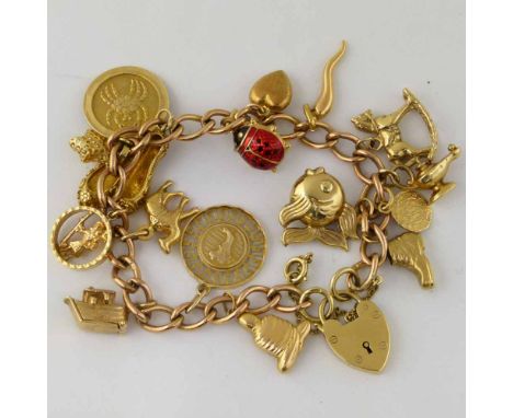 9ct gold chain bracelet with 9ct and unmarked charms, gross weight 41.3g.